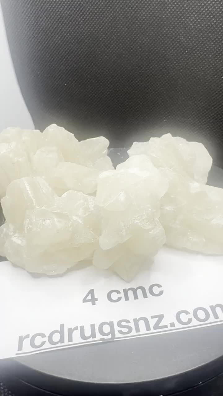 4-CMC crystals with a batch card.